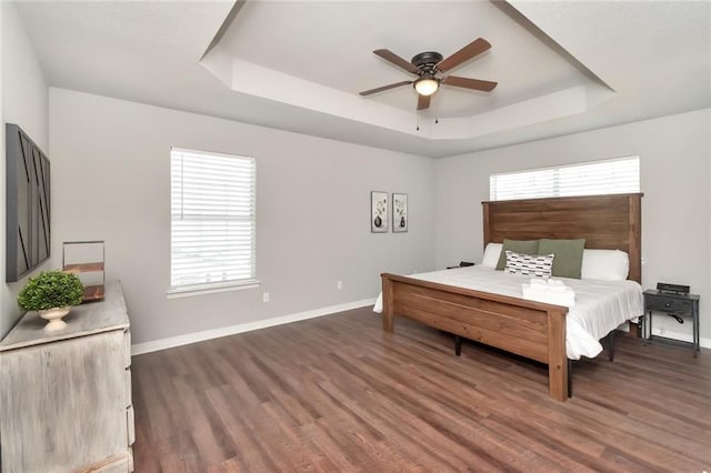 3132 Wellborne Dr W, Mobile, AL 36695 - bedroom with a tray ceiling, dark wood-type flooring, and a ceiling fan