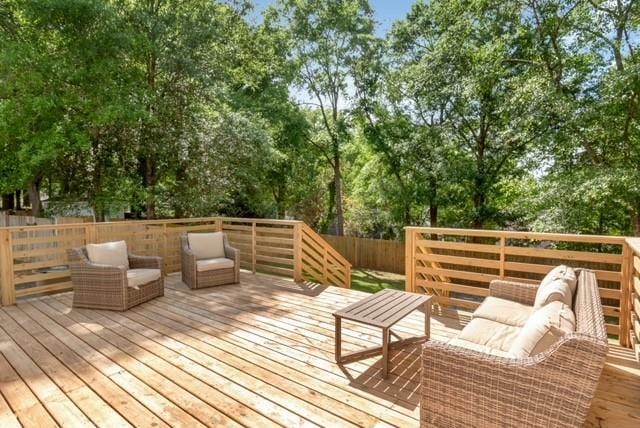 3132 Wellborne Dr W, Mobile, AL 36695 - deck with view of scattered trees and an outdoor hangout area