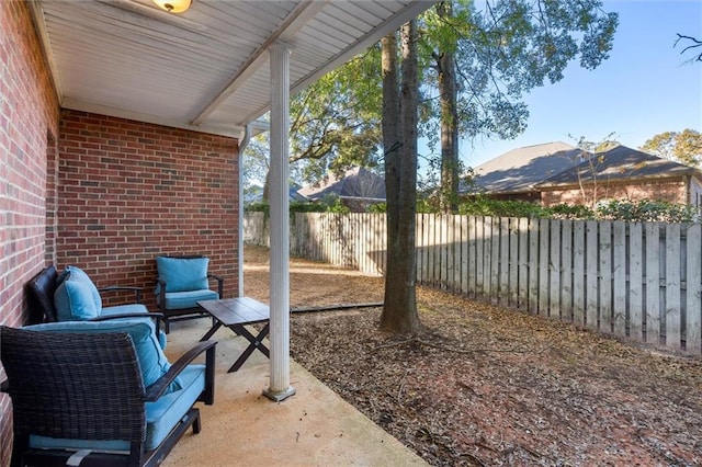 view of patio / terrace featuring a mountain view