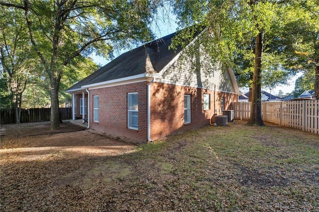 view of home's exterior featuring central AC