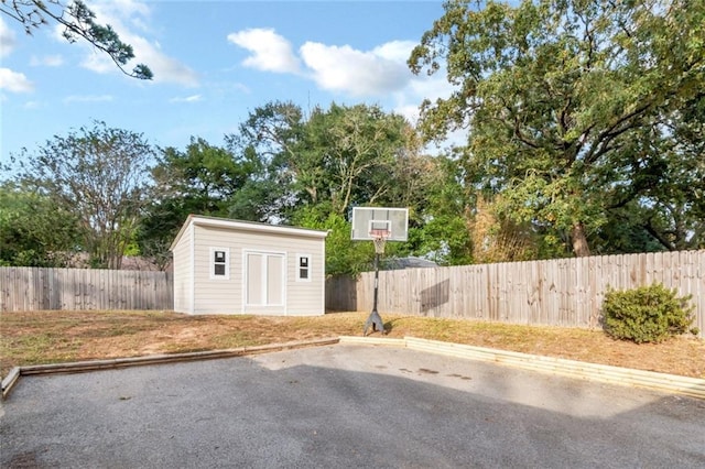 view of patio / terrace with a storage shed