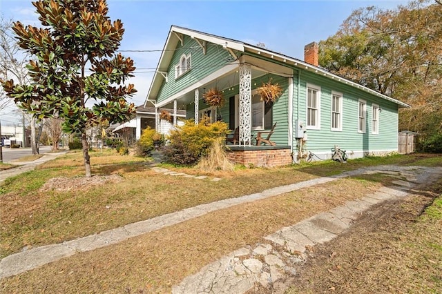 view of home's exterior featuring a lawn