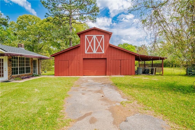 view of outdoor structure with a yard