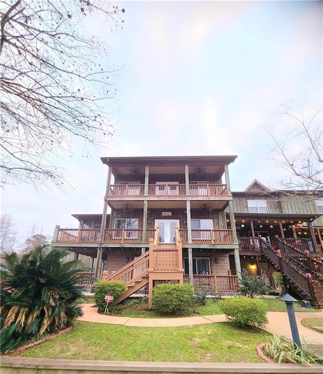 rear view of property with a balcony