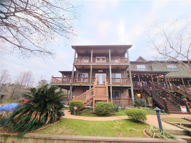 rear view of property with a balcony