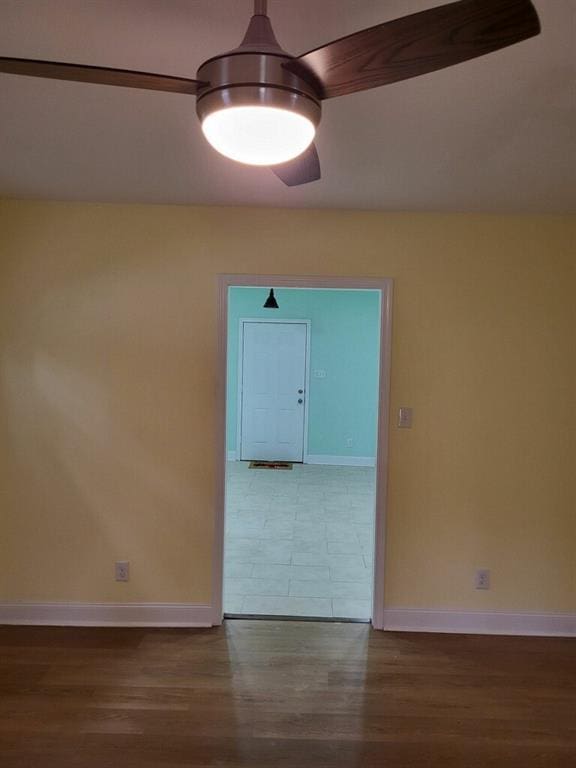 158 Randolph St, Mobile, AL 36607 - unfurnished room with baseboards, ceiling fan, and wood finished floors