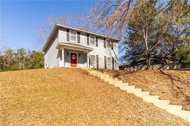 view of front of home with fence