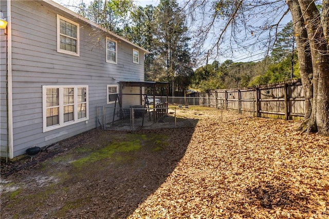 view of yard featuring a patio area and a fenced backyard