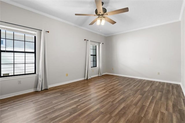 unfurnished room featuring ceiling fan, ornamental molding, and dark hardwood / wood-style floors