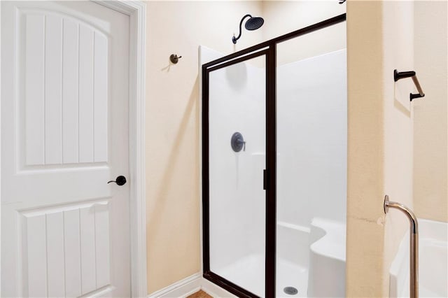 bathroom with an enclosed shower