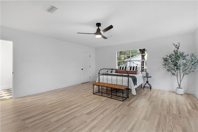 bedroom featuring ceiling fan and light wood-type flooring