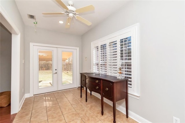 doorway to outside featuring french doors, light tile patterned floors, visible vents, ceiling fan, and baseboards