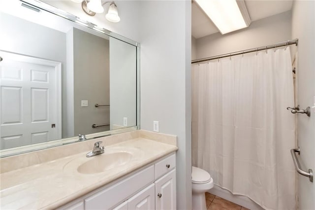 full bath featuring toilet, visible vents, tile patterned flooring, and vanity