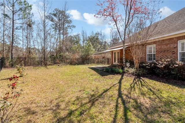 view of yard with a patio area and a fenced backyard