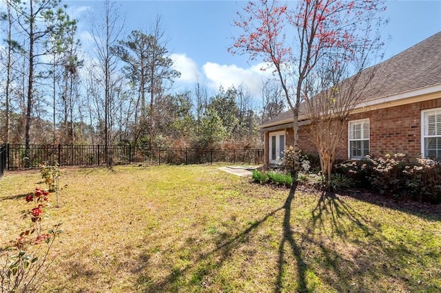 view of yard with a fenced backyard