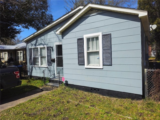 bungalow-style house with entry steps