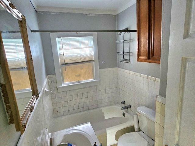 bathroom featuring a bathing tub and toilet