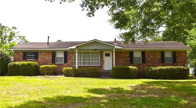 6208 Anthony Dr W, Theodore, AL 36582 - single story home with brick siding and a front lawn