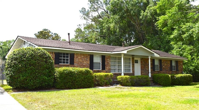 6208 Anthony Dr W, Theodore, AL 36582 - ranch-style house featuring a front lawn and brick siding