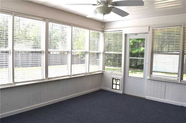 6208 Anthony Dr W, Theodore, AL 36582 - unfurnished sunroom featuring carpet floors, ceiling fan, and a healthy amount of sunlight