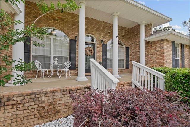 entrance to property with covered porch