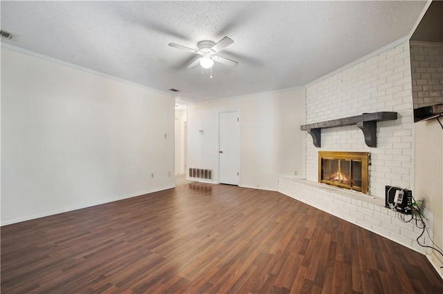 unfurnished living room featuring a fireplace, hardwood / wood-style floors, a textured ceiling, and ceiling fan