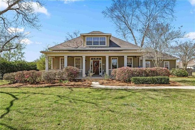 view of front of property with a front lawn and a porch