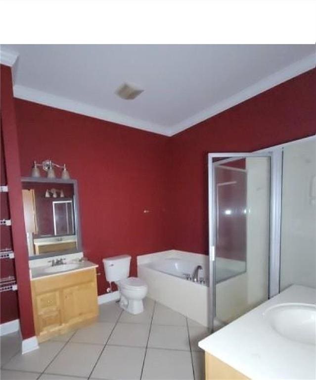 full bathroom featuring independent shower and bath, vanity, tile patterned floors, and crown molding