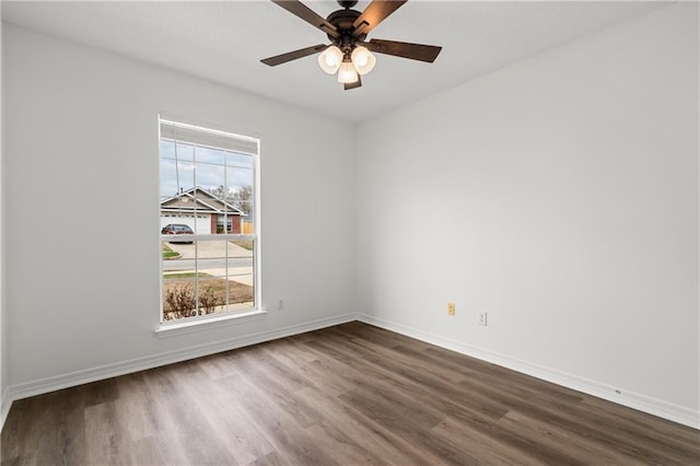 unfurnished room featuring hardwood / wood-style floors and ceiling fan