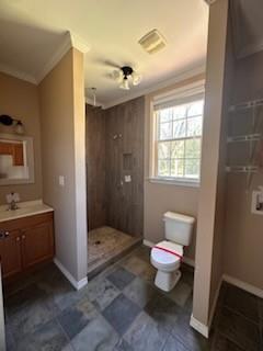 bathroom with toilet, vanity, ornamental molding, and walk in shower