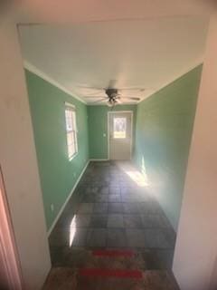 hallway featuring crown molding