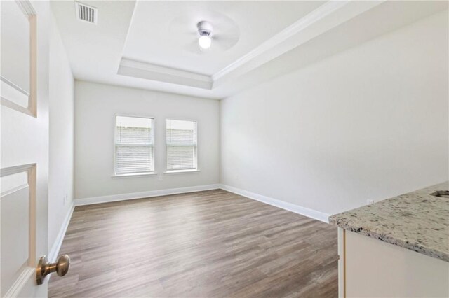 spare room with hardwood / wood-style flooring