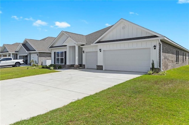 view of front of house with brick siding, concrete driveway, an attached garage, board and batten siding, and a front yard