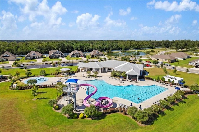 view of swimming pool featuring a water slide