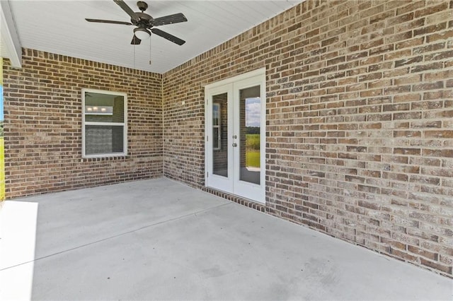 view of patio with ceiling fan and french doors