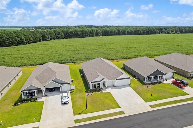 birds eye view of property with a rural view