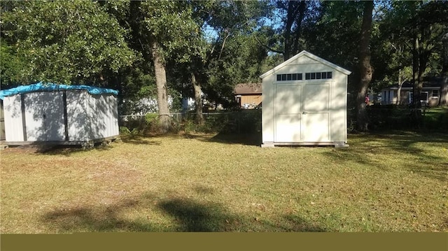 view of outdoor structure with a lawn