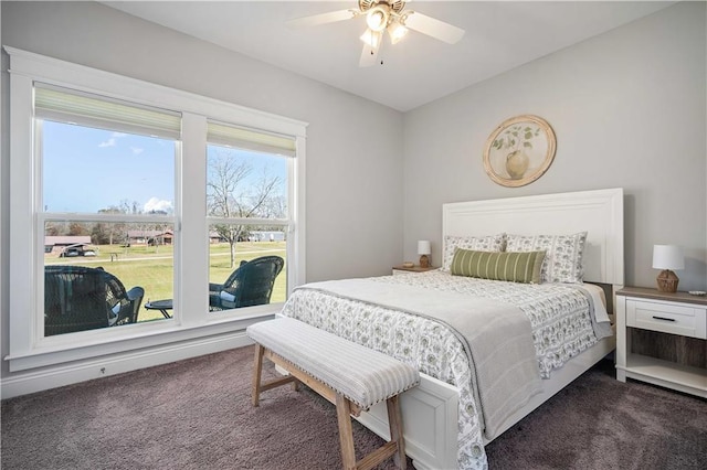 bedroom with carpet floors and a ceiling fan