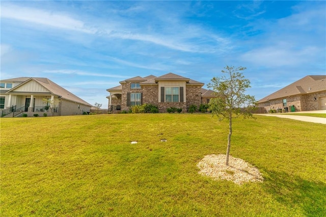 view of front of home with a front lawn