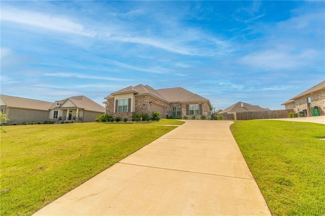 ranch-style home with a front yard