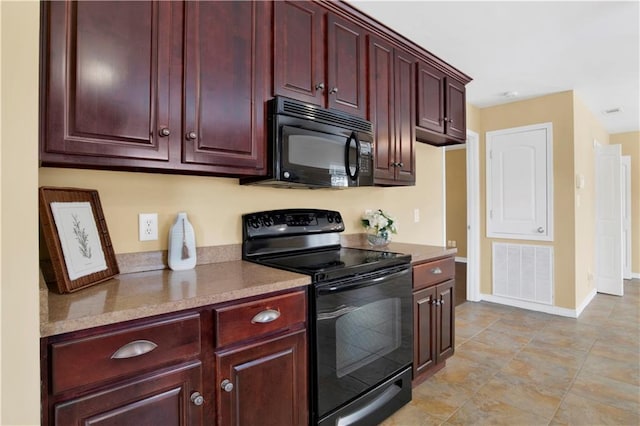 kitchen with black appliances