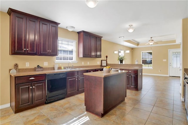 kitchen with dishwasher, hanging light fixtures, a center island, kitchen peninsula, and a raised ceiling