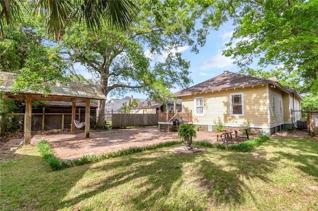 view of yard with a patio and a fenced backyard