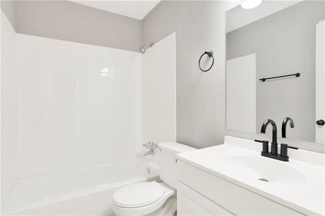 full bathroom with vanity, shower / washtub combination, and toilet