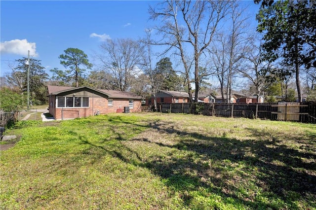 view of yard with fence