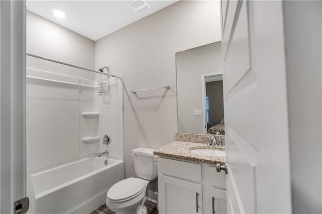 full bathroom with shower / bath combination, vanity, and toilet