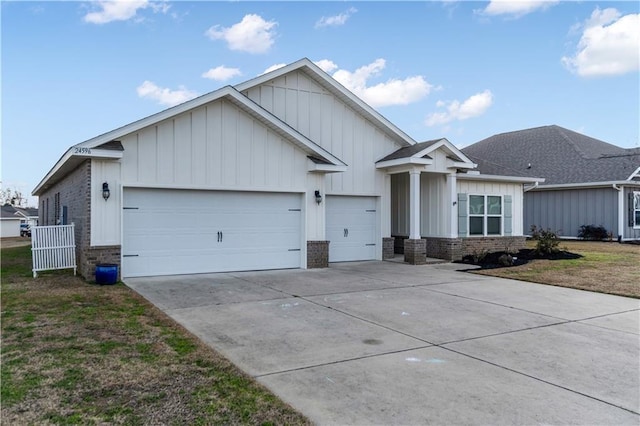 view of front of home with a garage and a front yard