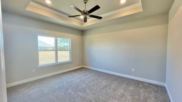 10706 Relic Rd N, Mobile, AL 36608 - empty room featuring a tray ceiling, ornamental molding, carpet, a ceiling fan, and recessed lighting