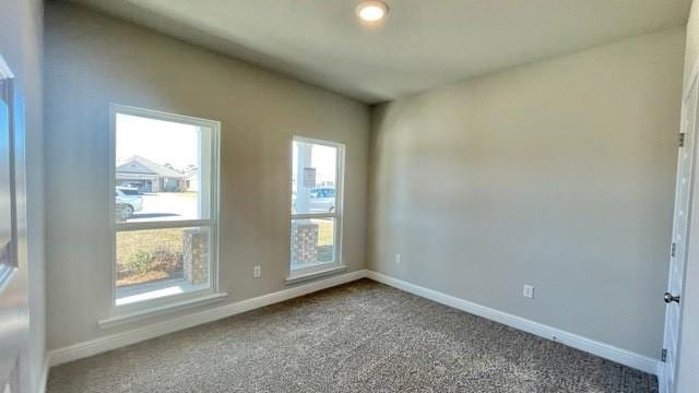 10706 Relic Rd N, Mobile, AL 36608 - spare room with baseboards and carpet floors