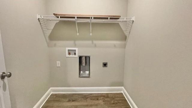 10706 Relic Rd N, Mobile, AL 36608 - washroom featuring hookup for an electric dryer, wood finished floors, and hookup for a washing machine